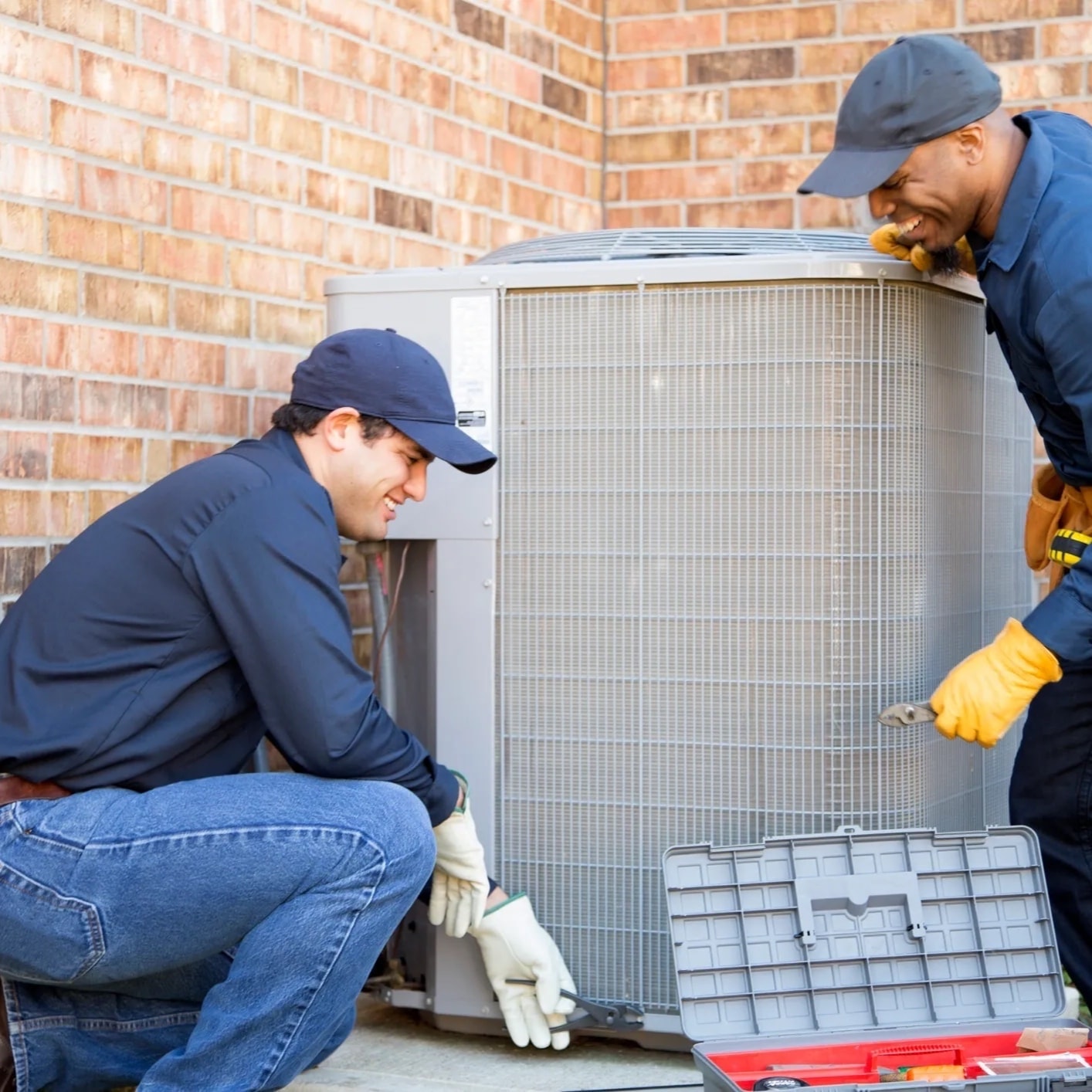 HVAC technician performing maintenance